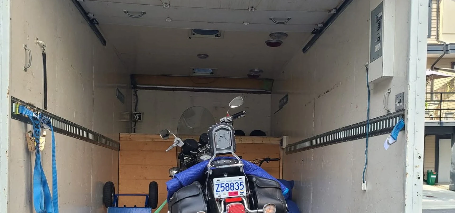 Motorcycle secured inside a Gorilla Moves express delivery truck in Fraser Valley BC