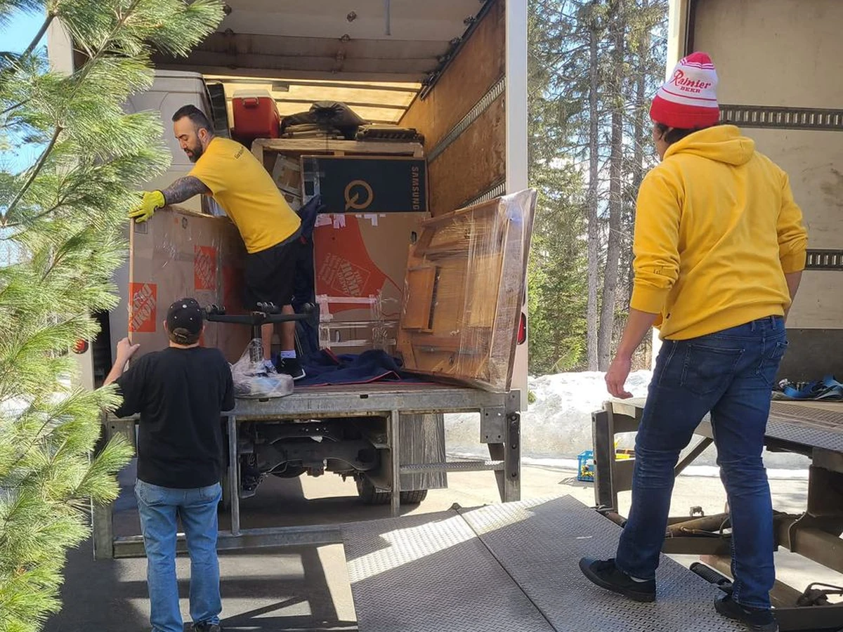 Gorilla Moves crew unloading a moving truck on a residential job in BC