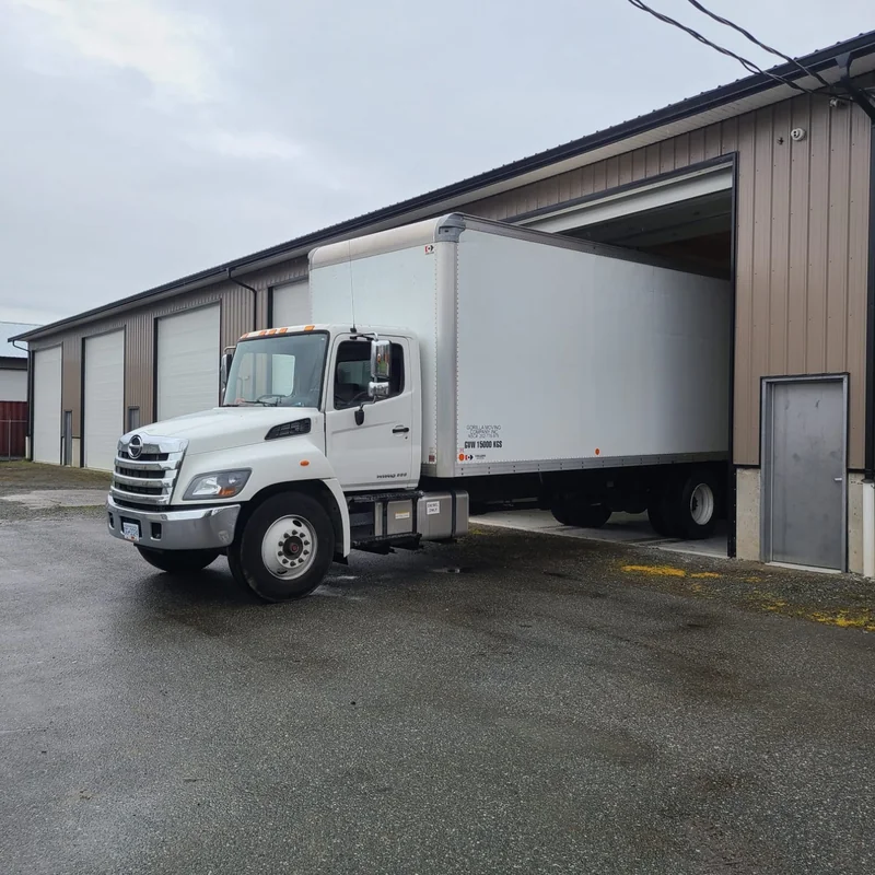 Gorilla Moves white glove crew carefully handling a specialty item during a luxury Fraser Valley relocation